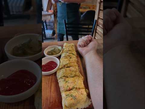 Eat like a Korean university student in Seoul! Head to Sinchon for this massive rolled egg!