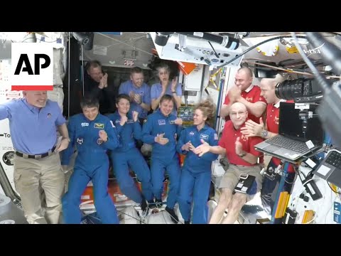 NASA’s stuck astronauts welcome their replacements to the space station