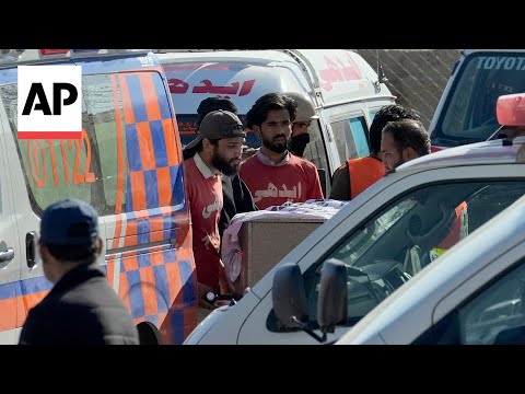 Bodies of victims of deadly train attack in Pakistan arrive at nearest railway station