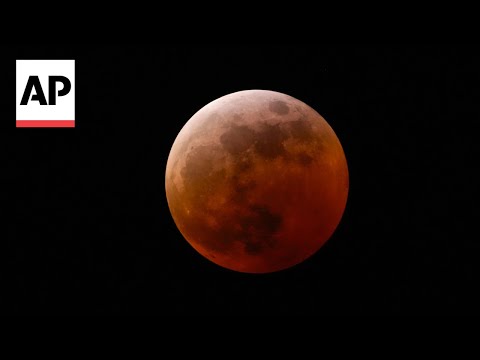 South Americans gather to observe the red ‘blood moon’ lunar eclipse